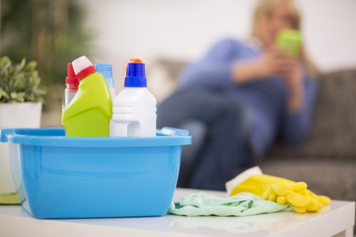 Local cleaner tidying a family bathroom in Balham